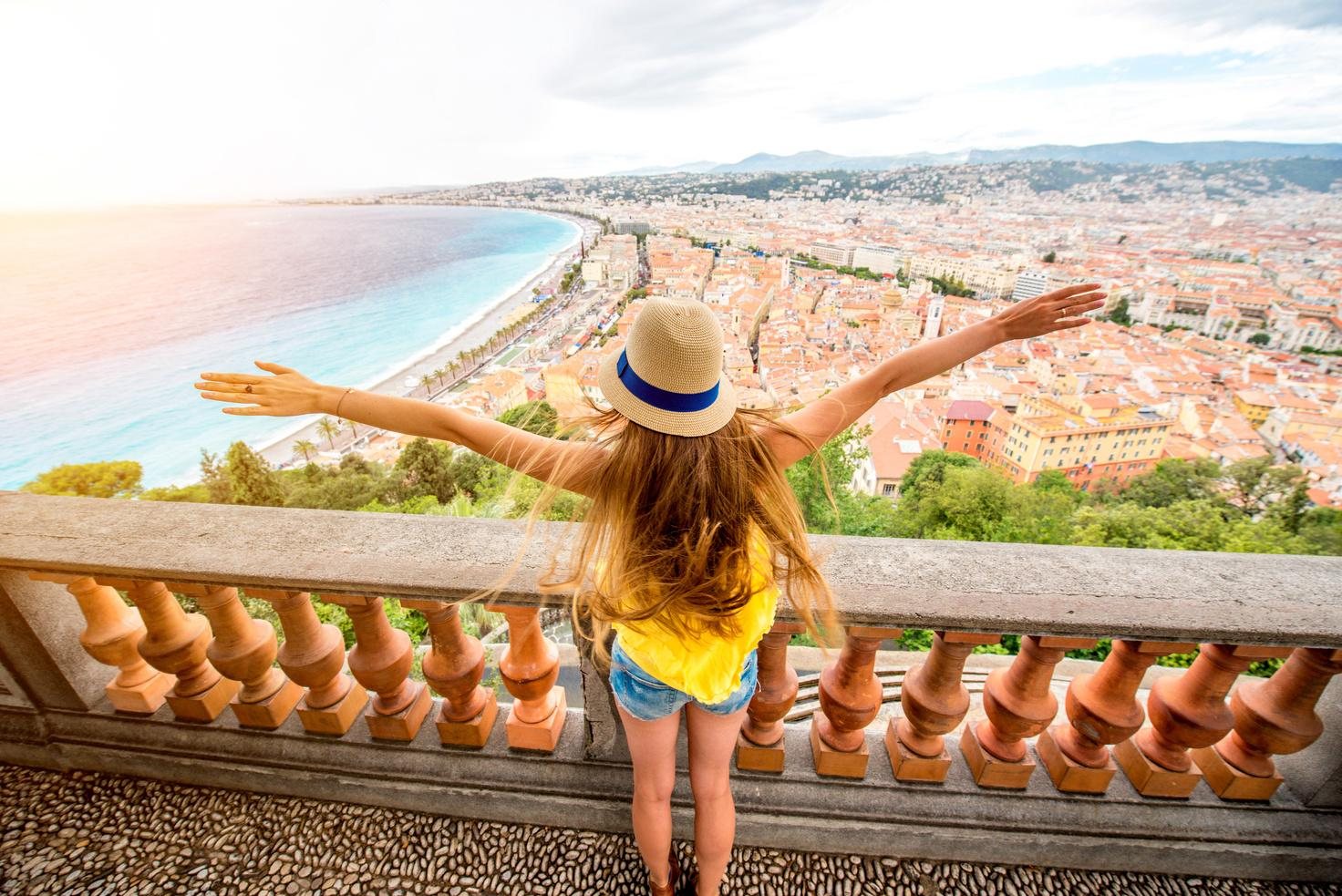 Traveller overlooking a Mediterranean city