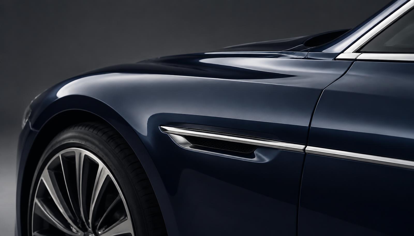 A close-up perspective of a luxury vehicle interior showcasing premium craftsmanship, representing the high-end automotive sector.